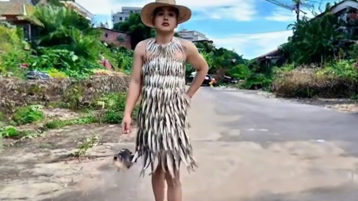 model wearing fish dress ent