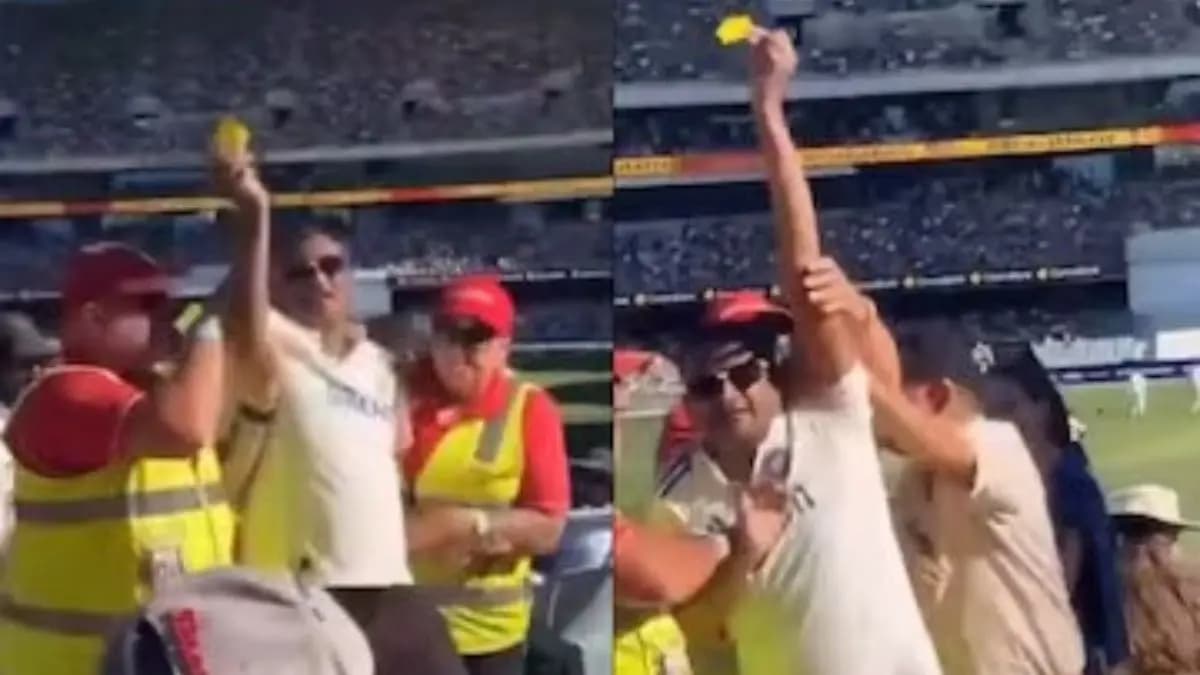 Indian fan ejected from crowd at Adelaide Oval for waving sandpaper