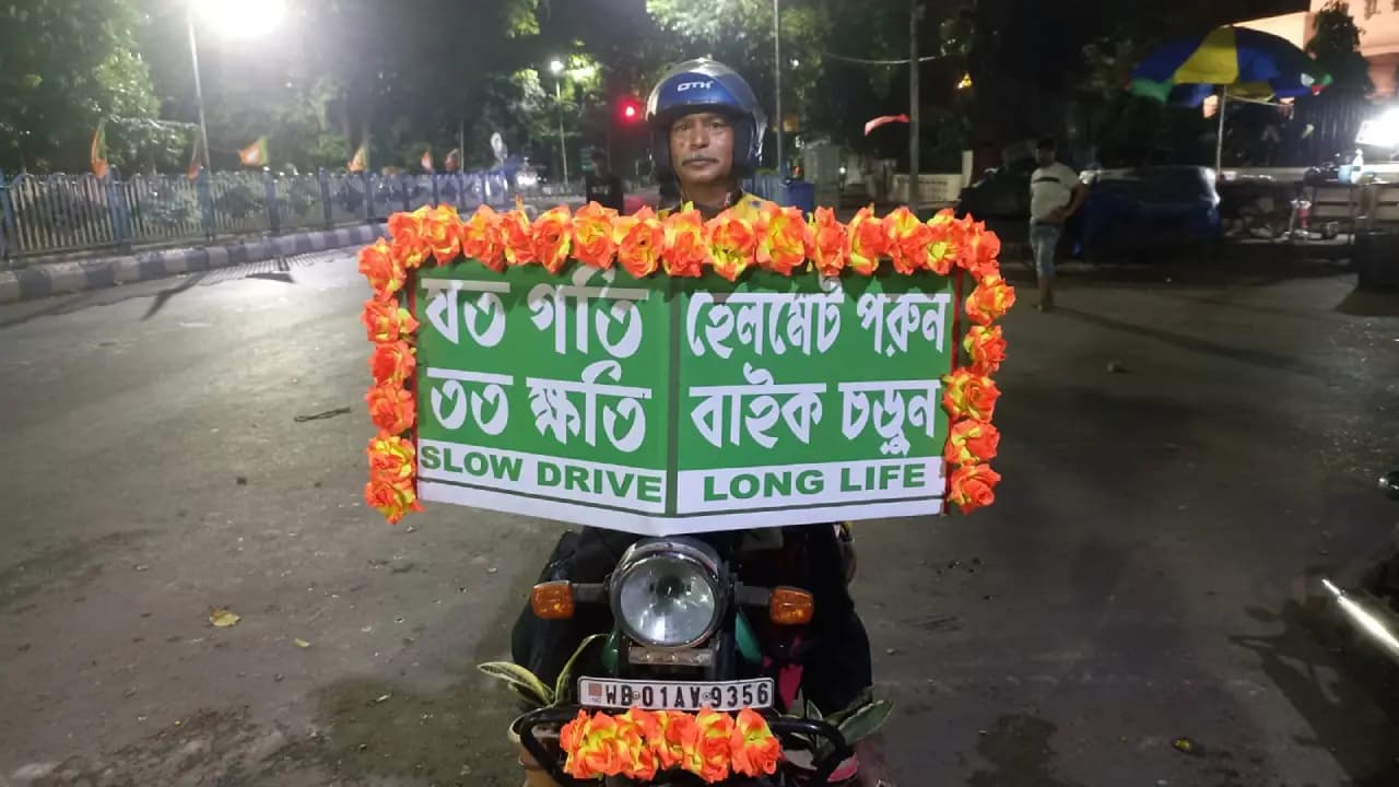 Artist Shibu Das riding his bike for 14 years to create traffic awareness among people