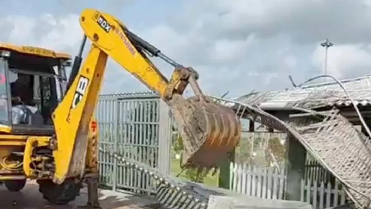 Buldozer Action in Saokat Molla Sons Cafe Aranyer Kule in Canning