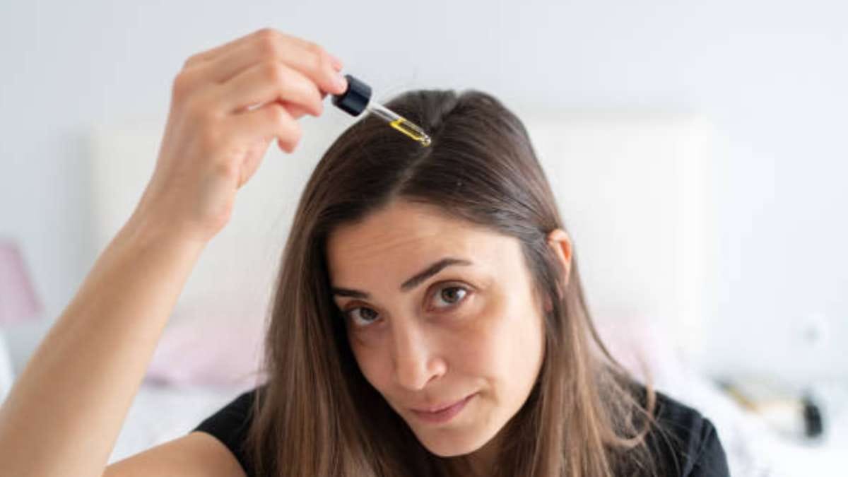 this home made natural hair serum made with hibiscus flowers can prevent dandruff and make your hair silky thick and shiny