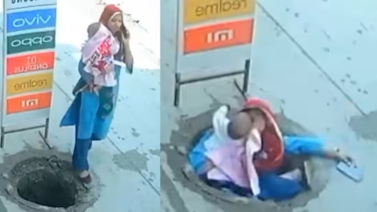 Woman Carrying baby fell into a manhole while talking on a phone